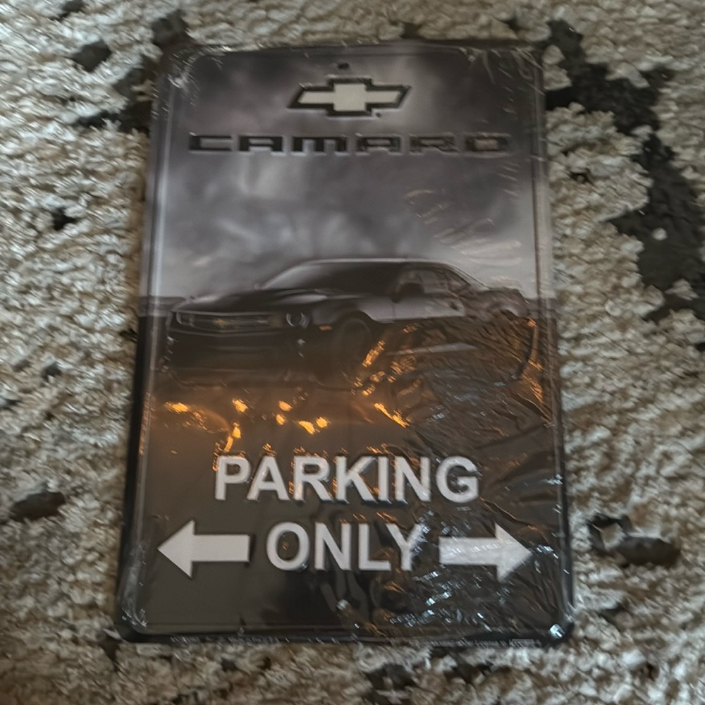 Camero parking only sign